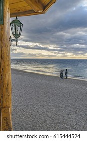 LOS ANTIGUOS, ARGENTINA, MARCH - 2016 - Group Of People Talking At Shore Of Buenos Aires Lake, In Los Antiguos, A Small Town Located In Santa Cruz Province, Argentina