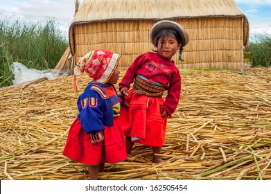 LOS UROS, PERU - FEBRUARY 5,2006 - Native Peruvian Children From The Uros Floating Island.