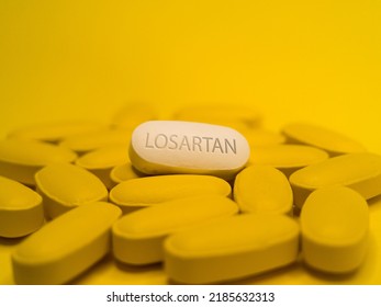 Losartan tablet pills medication used to treat high blood pressure hypertension, diabetic kidney disease, heart failure and left ventricular enlargement