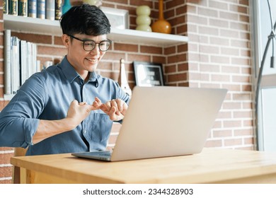 lose up asian man make gesture hand about sign language to teaching or talking to colleague in office meeting room for business lifestyle concept - Powered by Shutterstock