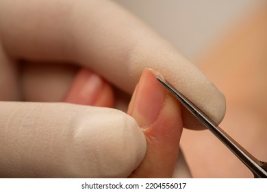 Lose Up Of Nail Cutting.