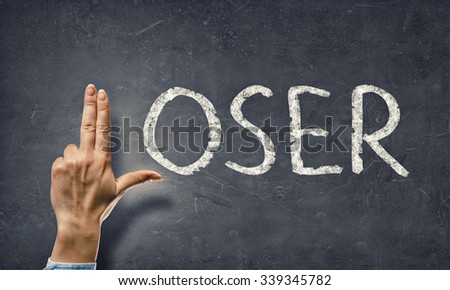 Loser word and human fingers instaed of letter L
