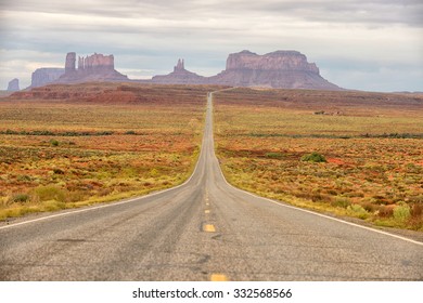 Lost And Alone On A Famous Empty Road In The Middle Of Nowhere In Monument Valley