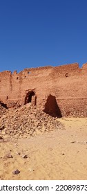 Lost City In Sahara Near Timimoun South Algeria. Archeogical Site. Traditional Ancient Desert Architecture. Deep Blue Sky And Red Sand Stones. December 2018 