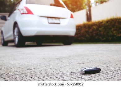 Lost Fall Car Key On The Street Concrete. 