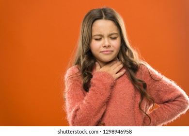 Lost Her Voice. Sore Throat Quick Remedies. Kid Feel Pain In Throat. Suffer From Pain Neck. Girl Painful Face Orange Background. Health Care And Medicine. Sore Throat Remedies. Throat Pain Treatment.