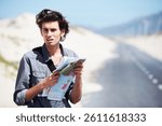 Lost, man and reading a map on a road trip, journey or planning travel on a highway. Check, location and confused person with paper maps, destination and search for direction to city in countryside