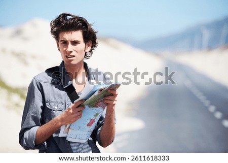 Lost, man and reading a map on a road trip, journey or planning travel on a highway. Check, location and confused person with paper maps, destination and search for direction to city in countryside