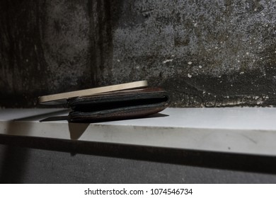 Lost Phone and wallet.Forget the phone and wallet in toilet. - Shutterstock ID 1074546734