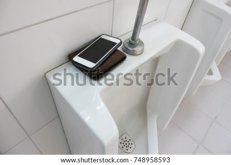 Lost Phone and wallet.Forget the phone and wallet in toilet.