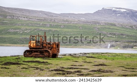 Lost place, rusty bulldozer in the flatlands of Iceland's Westfjords.