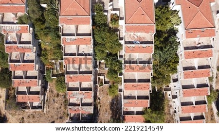 Lost places: Aerial view of an unfinished hotel complex in Izmir, Turkey with 96 apartment rooms is left to decay. Roof tiles, walls broken. Terrace construction already overgrown by nature lies in ru