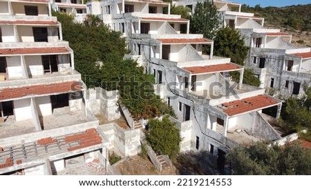 Lost places: Aerial view of an unfinished hotel complex in Izmir, Turkey with 96 apartment rooms is left to decay. Roof tiles, walls broken. Terrace construction already overgrown by nature lies in ru