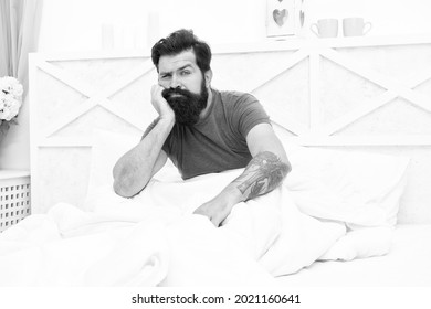 Lost In Thoughts. Brutal Male Does Not Feel Rested. Relax Lifestyle Concept. Tired Bearded Man In Bed. Early Wake Up At Morning. Bachelor Feel Sleepy. Guy At Bedroom. Lazy Sunday. Bed Time Routine