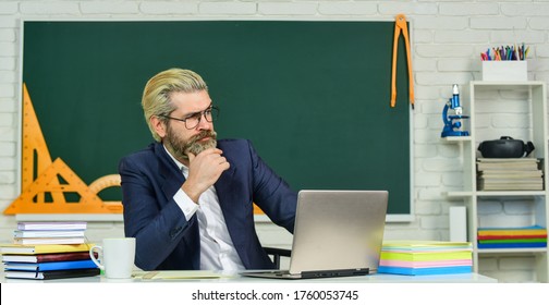 Lost in thoughts. Serious man back to school. Senior teacher look serious in glasses. Business coach thinking with serious face. Profound thinker. School and education. Serious and thoughtful.
