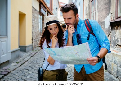 Lost Tourist On Vacation Reading Map