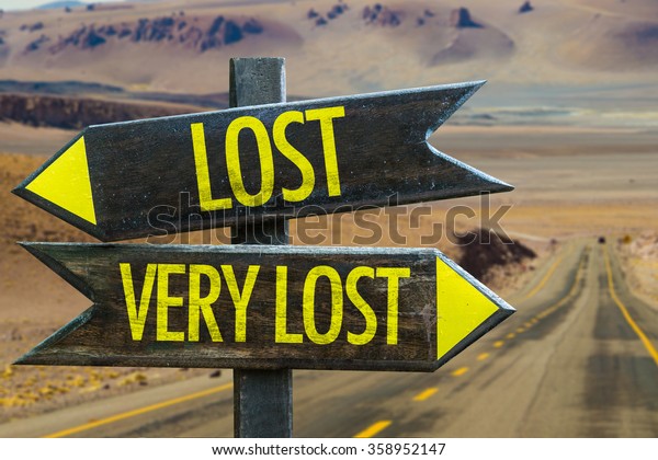 Lost - Very\
Lost signpost in a desert\
background