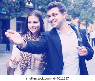 Lost Woman Asking Handsome Stranger To Show Direction 