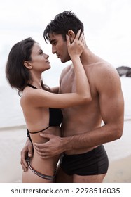 Lost in you and this beautiful place. an affectionate young couple at the beach. - Shutterstock ID 2298516035