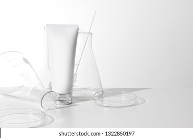 Lotion Cosmetic Beauty Facial Cream Container With Lab Science Glass Test Tube , Bottle Package Product Mockup On White Background, Medical Skincare Object Mockup, Healthcare And Product Spf Sunscreen