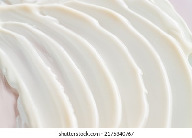 Lotion Texture. White Cosmetic Cream Smudged Background. Face Cream Close Up.