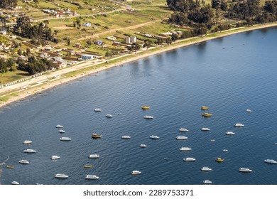 Lots of boats aligned in the same direction on the Lake Titicaca, Bolivia. View of Copacabana.
