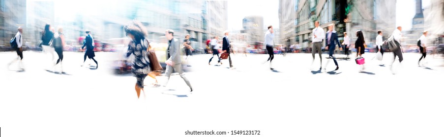 Lots of business people walking in the City of London. Blurred image, wide panoramic view of the road with people at sunny day. London, UK - Shutterstock ID 1549123172