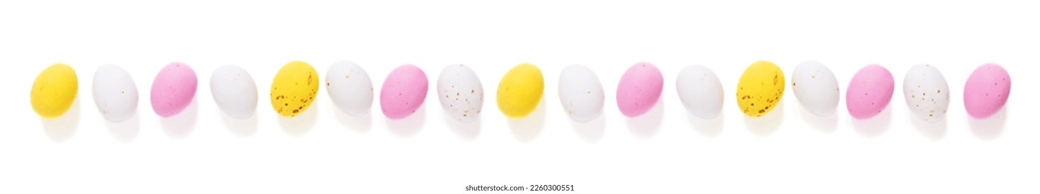 Lots of Candy easter eggs isolated on white background.	 - Powered by Shutterstock