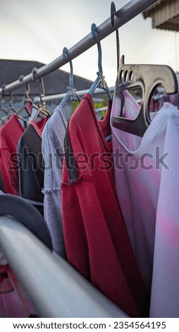 lots of clothes hanging on the clothesline
