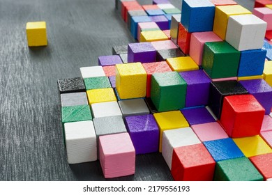 Lots Of Colorful Cubes On The Dark Surface. Variety Abstract Concept.