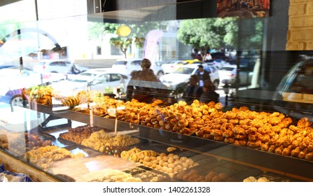 Lots Of Colorful And Tasteful Cakes In A Patisserie Shop