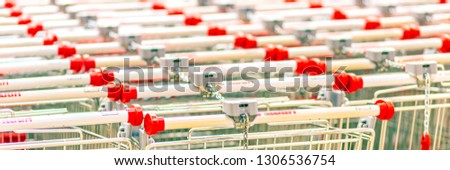 Lots of empty grocery carts at the store