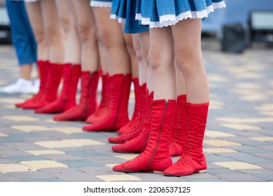 Lots Of Female Legs In Red Dancing Boots. Dance Shoes.