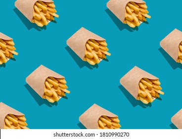 Lots Of French Fries In Paper Boxes Over Blue Background, Geometric Seamless Design, Creative Repeat Pattern, Top View