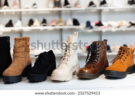 Lots of leather wintry male and female shoes at shop