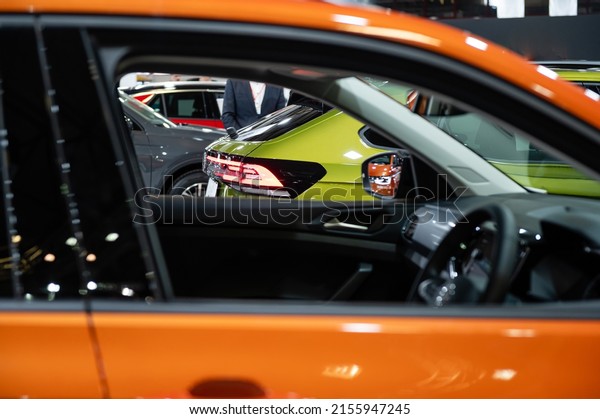 lots of new shiny cars,\
selective focuss, boheh, details, closeup, traffic background, copy\
space