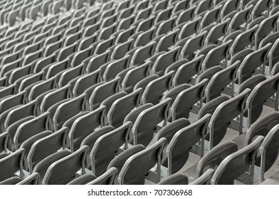 Lots Of Reclining Chairs On The Stadium Bleachers With No People Before The Sporting Event