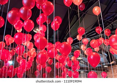 Lots Of Red Helium Filled Balloons