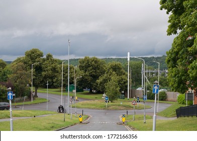 Lots of road signs by a roundabout in Berkshire, UK - Shutterstock ID 1772166356