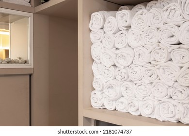 Lots Of Rolled Up White Towels In A Beauty Salon