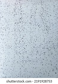 Lots Of Small Black Dots On A White Background.