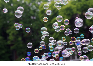 Lots of soap bubbles in the air