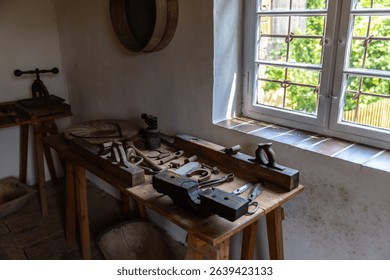 lots of tools in an old workshop from a workbench