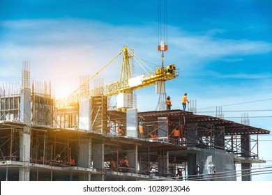 Lots of tower Construction site with cranes and building with blue sky background - Shutterstock ID 1028913046