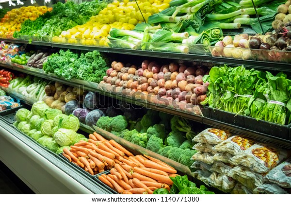 Lots\
of Vegetables in the Produce aisle at a\
Supermarket
