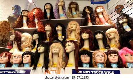 Lots Of Womens Wigs On Shelves