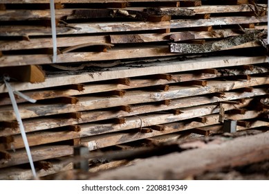 Lots of wooden boards in a fine material sawmill - Shutterstock ID 2208819349