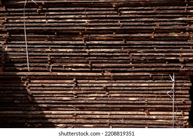 Lots of wooden boards in a fine material sawmill - Shutterstock ID 2208819351
