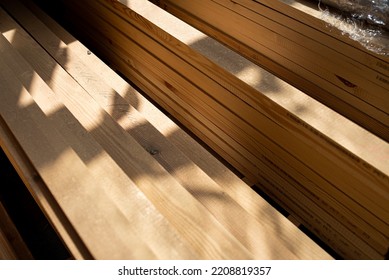 Lots of wooden boards in a fine material sawmill - Shutterstock ID 2208819357