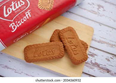 Lotus Biscoff biscuit on wooden tray with white background. Jakarta, 2021.